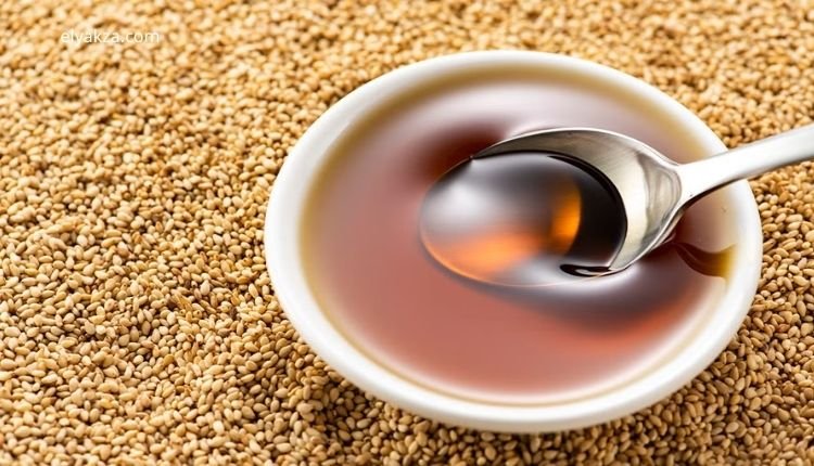 دليلك الشامل لوداع الشيب: طرق طبيعية فعالة لشعر حيوي 2 زيت السمسم للشعر