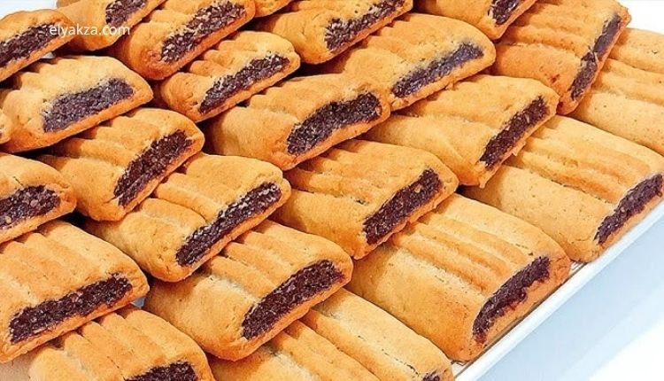 بسكوت التمر بالعجوة: تحفة فنية من مطبخك بنكهة لا تُنسى 1 طريقة عمل بسكوت التمر بالعجوة